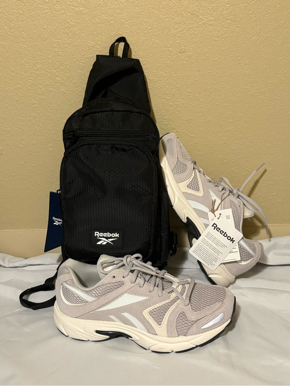 Reebok Light Gray and White Running Shoes with Black Reebok Sling Bag